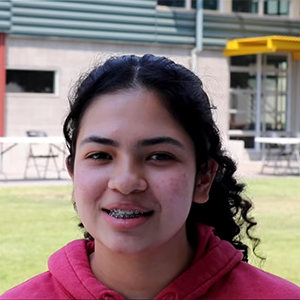 Female student smiling outside on Eastside's campus